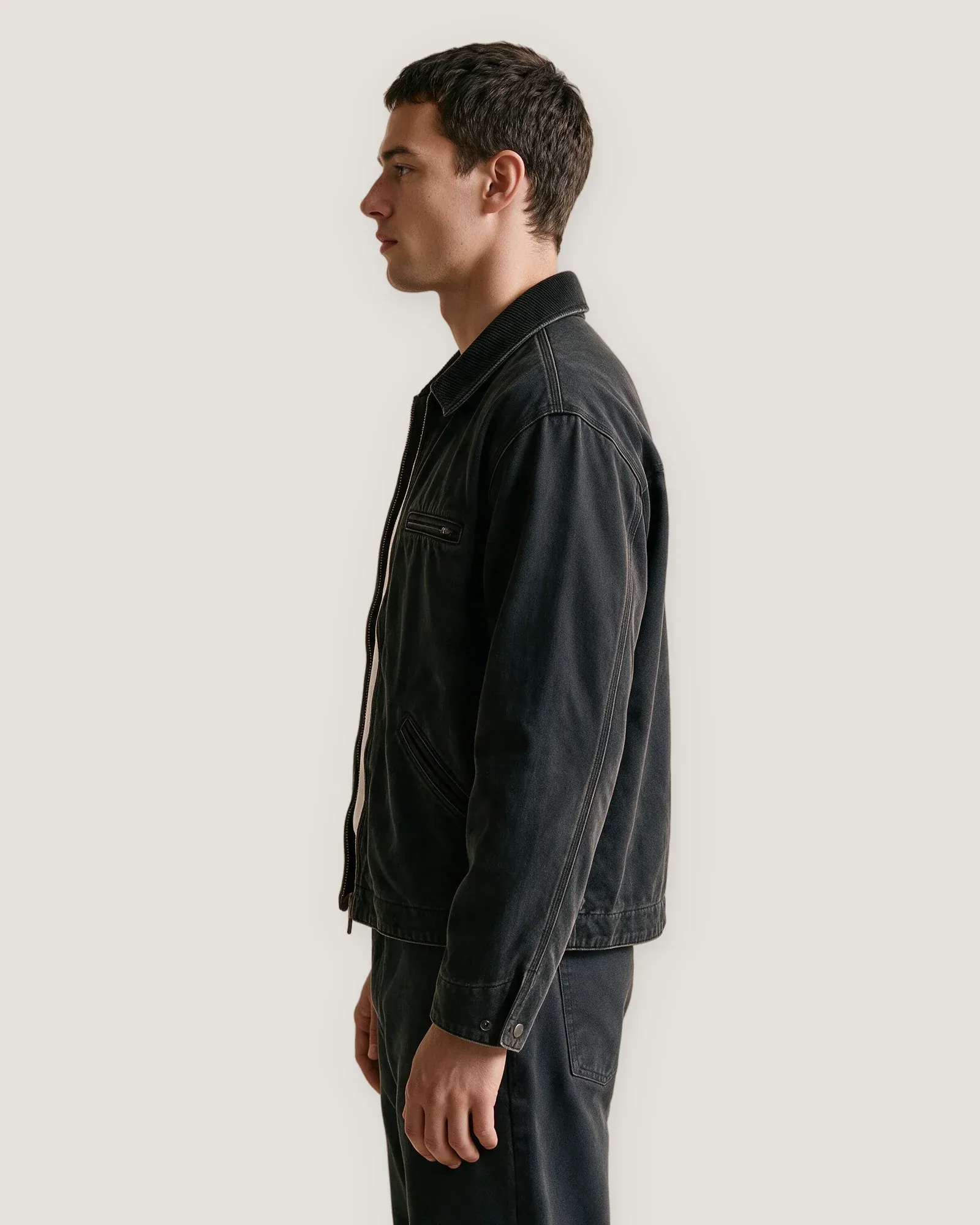 Model wearing the Shoreditch Work Jacket, side view