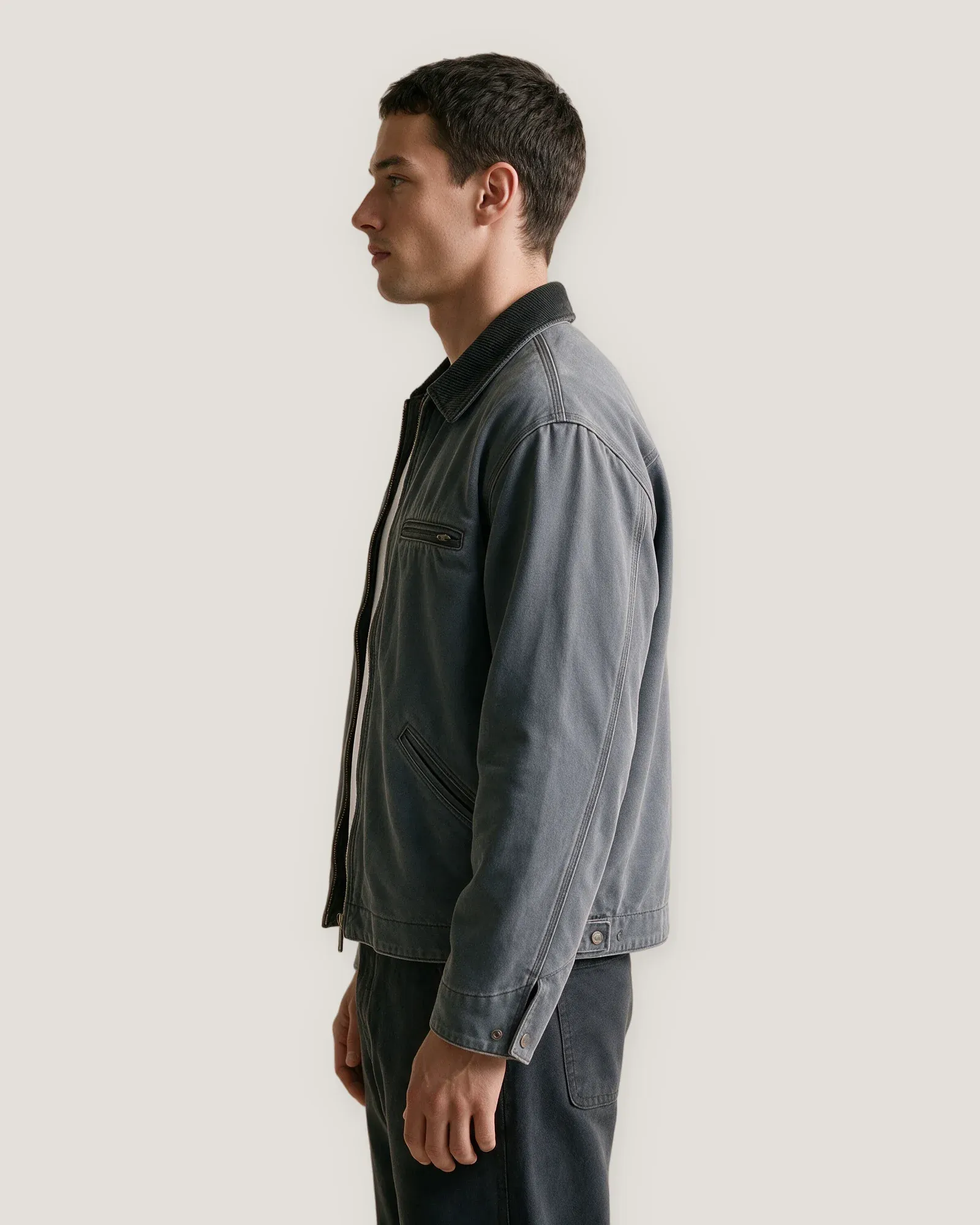 Model wearing the Shoreditch Work Jacket, side view